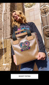 Model Holding Char Classic Tote Bag with a text box saying "Shop Totes"